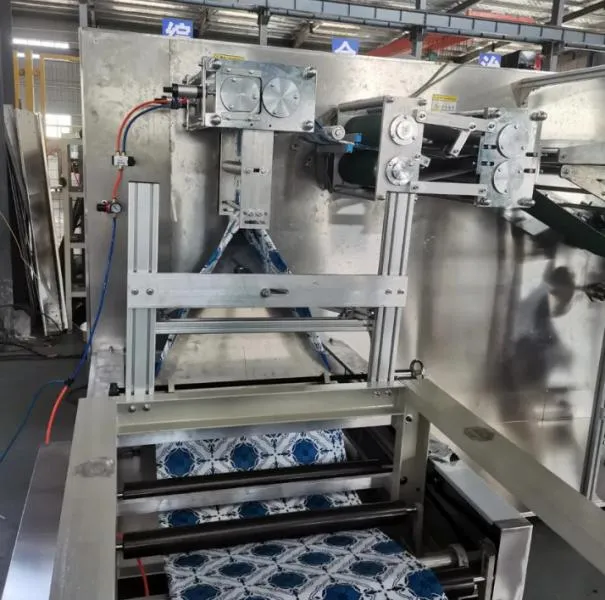 картинка Линия для резки, складывания и упаковки скатертей (модель DR-1400) от магазина Метасила