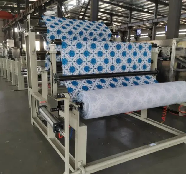 картинка Линия для резки, складывания и упаковки скатертей (модель DR-1400) от магазина Метасила