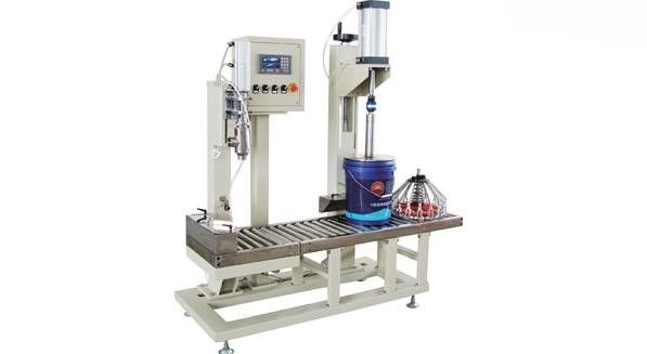 фото Станок для розлива жидкостей в железные банки H27NC от магазина Метасила