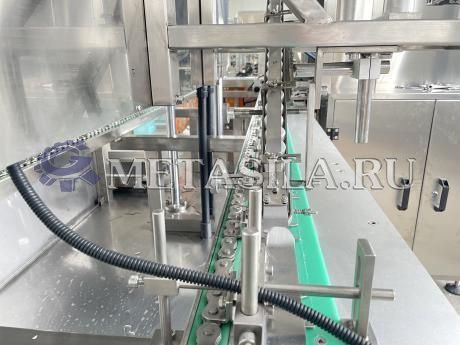 фото Линия для наполнения и укупорки жидкости в пакеты от магазина Метасила